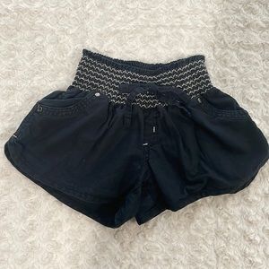 Size M stretch waist cotton shorts with pockets. Run small. Black in color